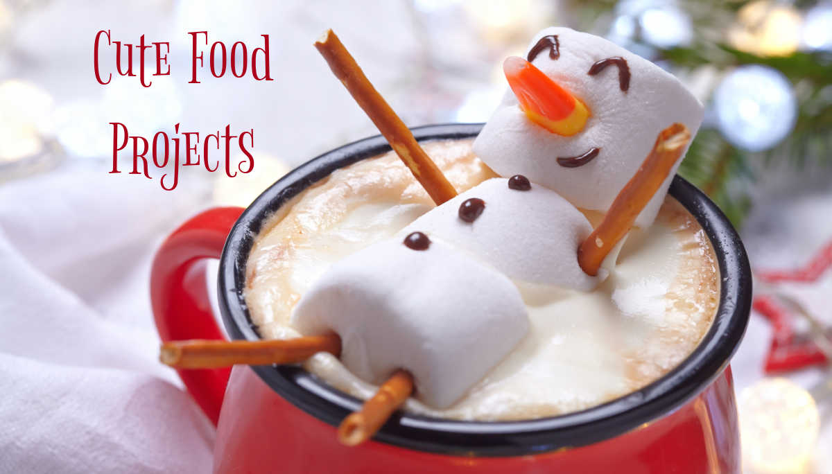 Snowman made from candy corn, marshmallows and pretzel sticks floating in hot chocolate with words DIY Food Projects.