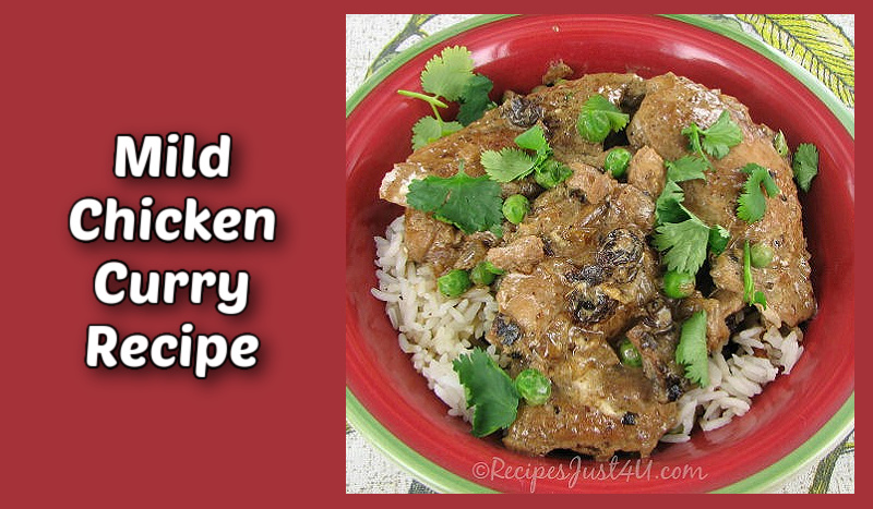 Mild chicken curry recipe in a red bowl, garnished with cilantro.