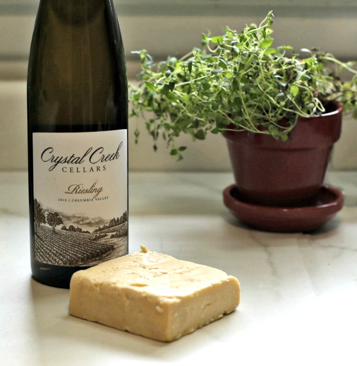 Wine and cheese with thyme