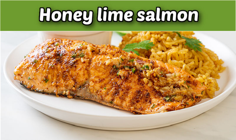 Honey lime salmon on a white plate with rice.