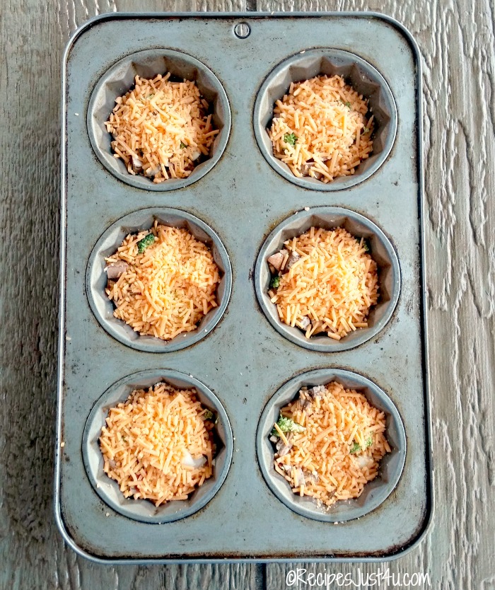 Add your favorite cheese to the muffins.