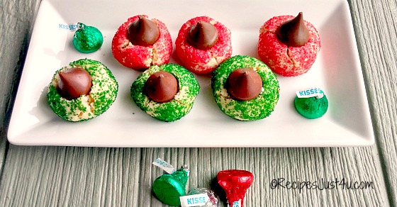 These holiday kiss cookies are the perfect bite of Christmas cheer. They are not too sweet and this version is made without the peanut butter. Serve them plain all year long or decorated for the holidays. recipesjust4u.com