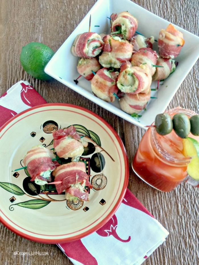 Bacon wrapped chicken bites with a Bloody Mary drink.