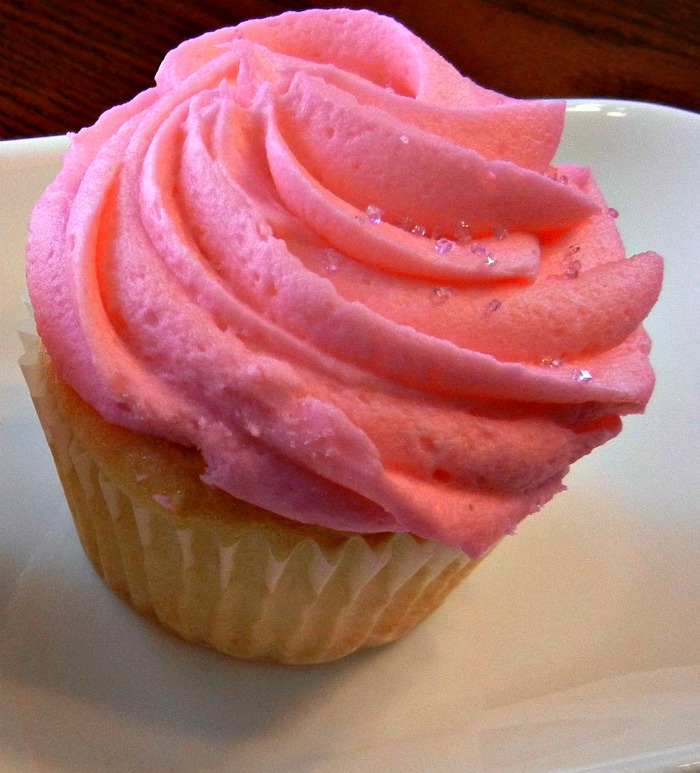 Frosted cupcake with pink icing