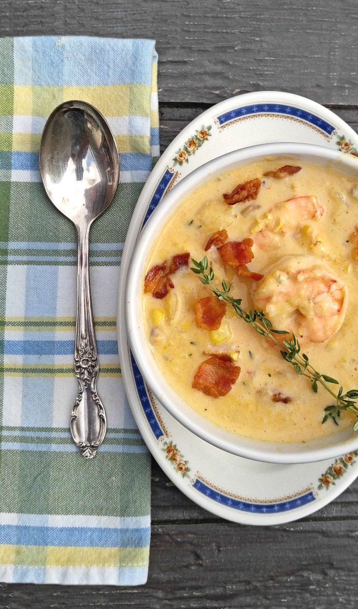 This shrimp chowder recipe is flavored with corn, bacon and fresh thyme. #shrimpchowder #shrimpbisque