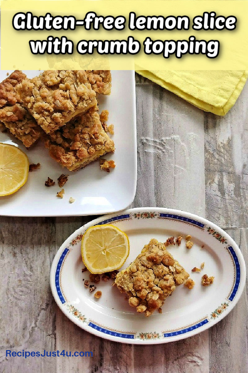 How to Make Gluten-Free Lemon Slices A gluten-free lemon slice with a crumb topping on a white and blue plate with a yellow napkin.