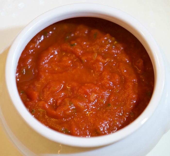 Make a tomato sauce substitute using tomato paste and water.