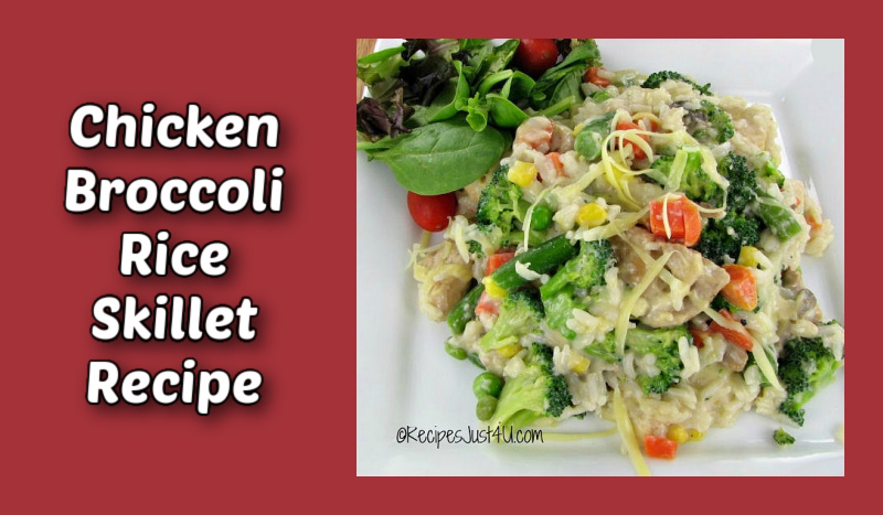 Chicken broccoli rice skillet meal on a white plate with a salad.