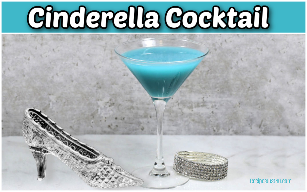 Cinderella cocktail in a martini glass, next to a glass slipper and rhinestone cocktail bracelet.