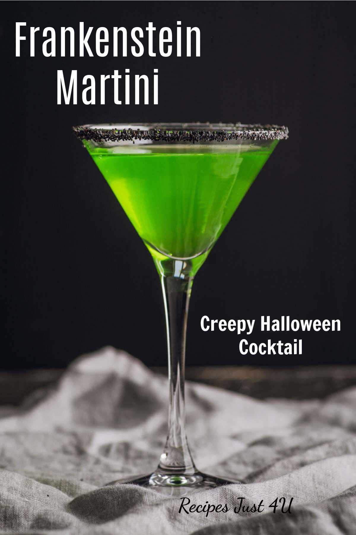 Green drink in a martini glass with words Frankenstein martini - creepy Halloween cocktail recipe.