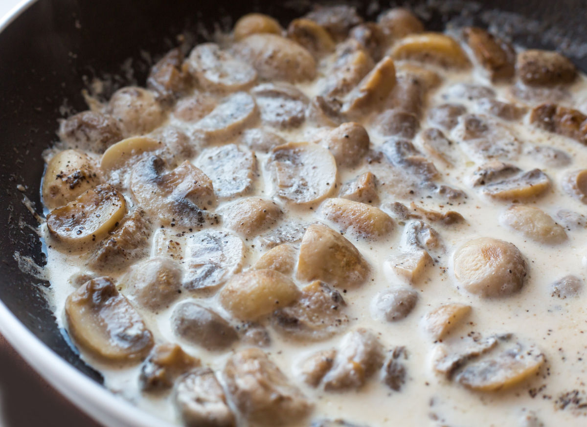 Making a mushroom cream sauce for chicken scallopini recipe.