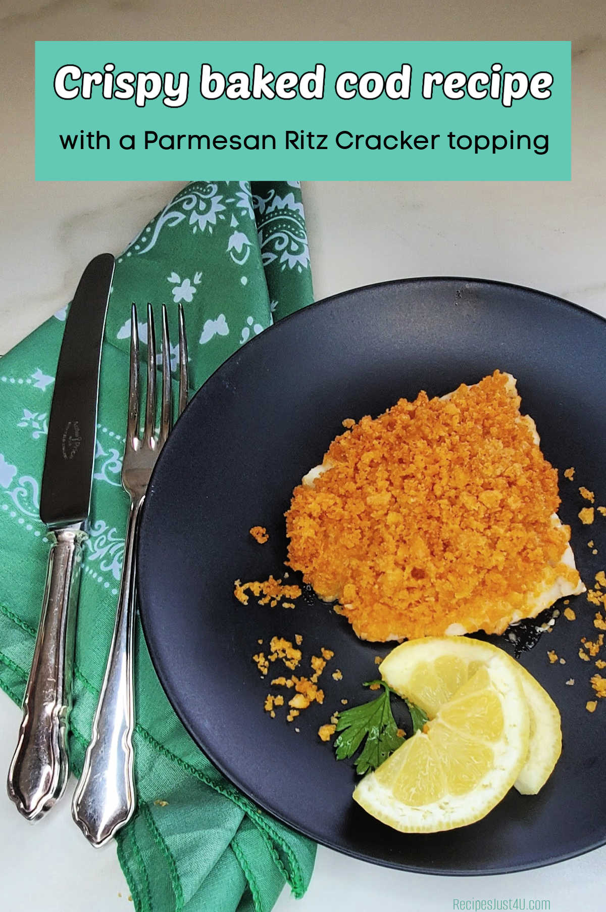 Fish with crumb topping on a black plate with napkin and cutlery. Teal text box reads Crispy baked cod recipe with Parmesan Ritz cracker topping.