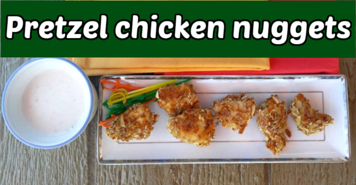 Pretzel coated chicken pieces on a plate with fork, napkins and ranch dressing. Green text box reads pretzel chicken nuggets/