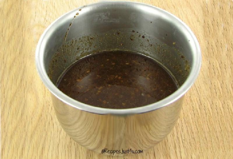  A metal bowl containing Chinese chicken skewers marinade.